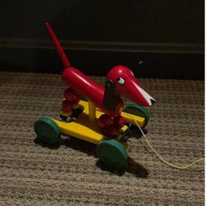 Brio pull along red dog toy